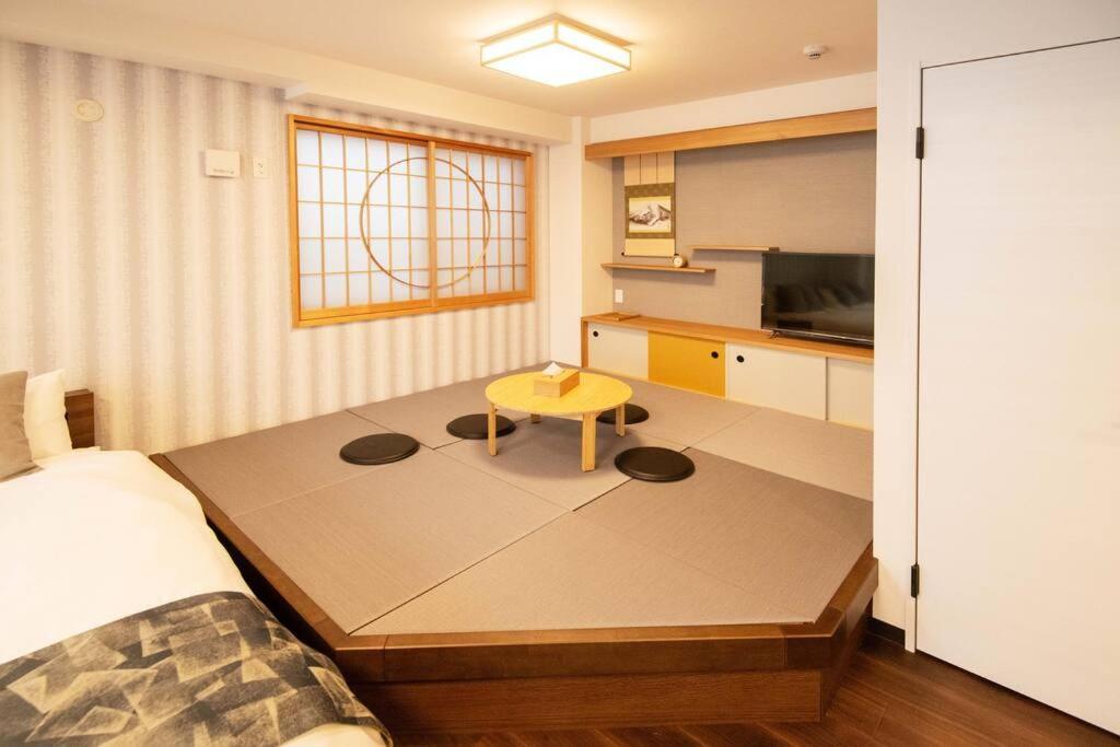 Apartment 浅草禅心居301室 浅草駅徒歩15分 2024年4月ニューオープン 43平米丸貸し切り ダブルベット2台と畳敷き布団2組 家庭式用品設備完備 Präfektur Tokio